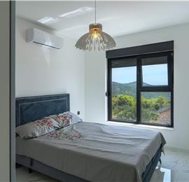 Three bedroom villa with heated pool and sea views near Trogir. Sleeps 6